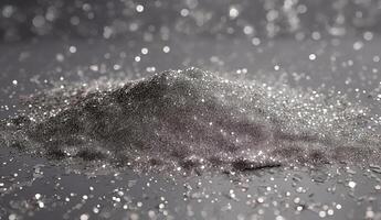 A pile of silver powder on a table photo