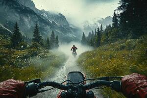 Two riders navigate a muddy trail in a mountainous landscape under rainy clouds. The atmosphere is filled with mist, enhancing the adventure of the challenging terrain. photo