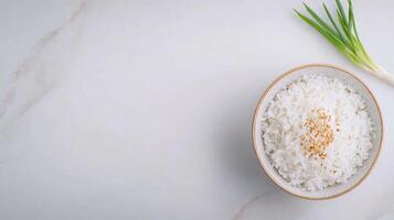 Fluffy Jasmine Rice in Simple Bowl with Green Onion photo