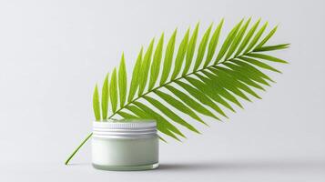 Fresh Green Leaf with Jar of Cream on Light Background for Natural Beauty and Wellness Concepts photo