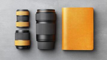 Professional Camera Lenses and Notebook on Gray Table for Photography Enthusiasts and Creatives photo