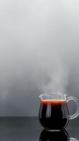 Surreal Coffee Brewing Setup with Steam on Black Reflective Surface Against Soft Gray Background photo