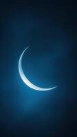 Glowing Crescent Moon Illuminating the Dark Night Sky with a Dreamy Atmosphere and Tranquil Serenity photo