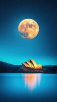 Golden Futuristic Opera House Reflecting on Still Water Under Bright Moonlight at Dusk photo