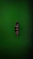 Aerial View of a Lone Boat Floating on Magical Green Water with Beautiful Ripples and Reflective Serenity photo