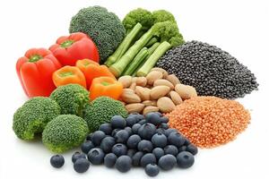 Fresh Ingredients for Healthy Eating Assorted Vegetables, Grains, and Nuts on a White Background photo