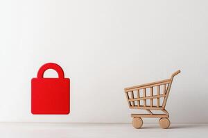 Shopping App Concept with Glowing Buy Button on Smartphone Next to Miniature Shopping Cart photo