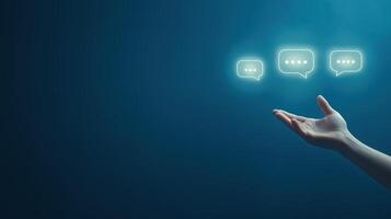 Hand Reaching Out to Digital Chat Icons Symbolizing Support from AI and Technology Innovation photo