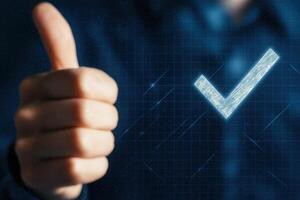 Businessman Showing Thumbs Up with Digital Checkmark Icon for Verification Process and Approval Concept photo