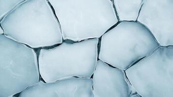 Cracked Ice Surface with Diverse Textures and Patterns in Cool Blue Tones and Natural Light photo