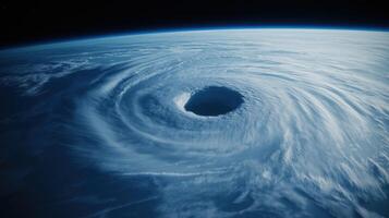 Satellite View of Powerful Hurricane Forming Over the Ocean with Swirling Cloud Patterns photo
