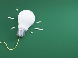 Idea learning concept with light bulb on green Background, copy space photo