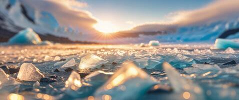 Abstract view of a glacier with rocks and golden light shining through the ice formation surface. photo