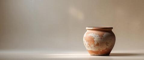 Empty terracotta pot with rustic texture and natural earthy tones. photo