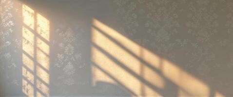Sunlight on a wall with a patterned wallpaper photo