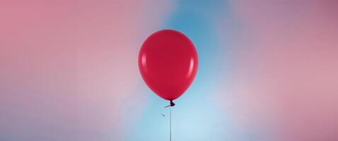 A red balloon floating in the air photo