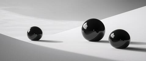 Three black round objects are on a white surface photo