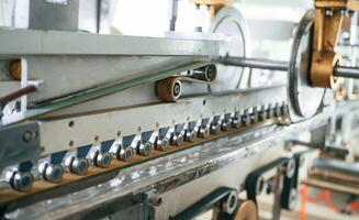Close up, view of factory machine indoors at daytime photo