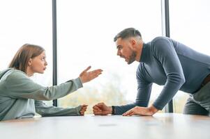 Man, is screaming at his girlfriend, conception of quarrel photo