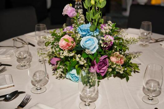 a table with a centerpiece photo