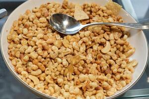 corn mix snacks with fried garlic photo