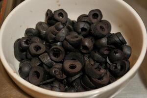bowl of chopped black olives photo