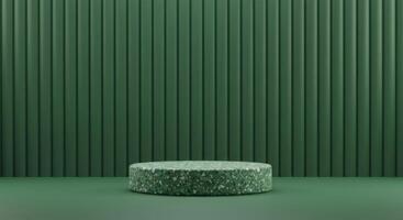 A green terrazzo cylinder stands on a matching green surface before a vertically ribbed green wall photo