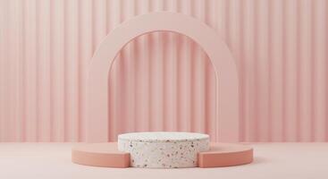 A speckled terrazzo cylinder rests on a pink semi-circular base beneath a pink arch against a softly draped pink backdrop photo