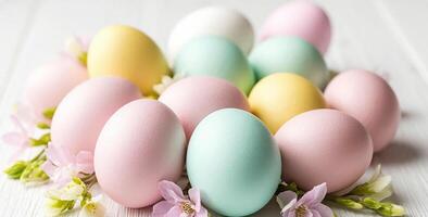 Pastel-colored eggs on the table photo