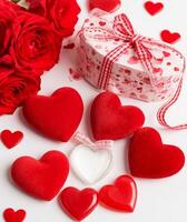 Heart-shaped box with a red and white polka-dot pattern tied with a checkered ribbon photo