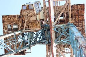 Old Rusty Industrial Crane photo