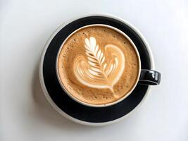 Aerial View of Cappuccino with Heart and Leaf Foam Art Coffee Image photo