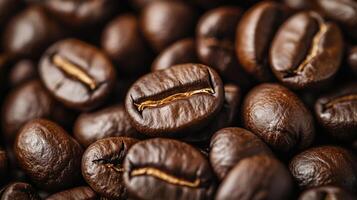Close up of roasted brown coffee beans. Pile of aromatic coffee grains showing textures. Dark beverage ingredient macro photograph. photo