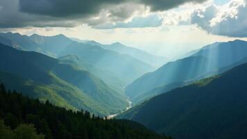 Mountains And Sunlight Rays In Summer photo