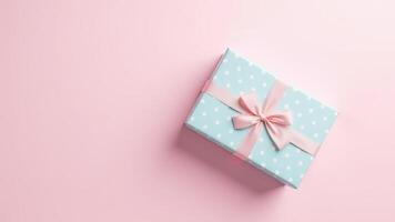 Light Blue Gift Box With Pink Ribbon photo