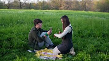 Outdoor Relaxation A Young Couple Engaged in Various Creative Activities Together in Nature video