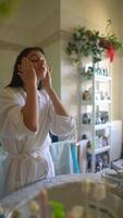 Enjoy a Refreshing Skincare Routine in an Inviting and Brightly Lit Bathroom Space video