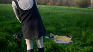 A Young Individual in Nature Engaging in Various Artistic Supplies and Activities video