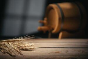 Background for beer presentation. Wheat and barrel in the cellar photo
