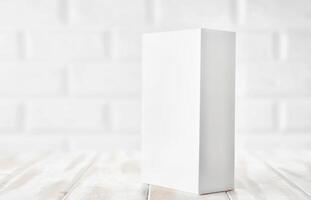 White packing box from a smartphone or other equipment on the table photo