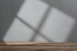 Empty table top for product presentation with window light photo