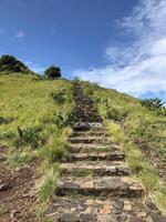 The stairs with a beautiful view to the top of Padar island in Indonesia. photo
