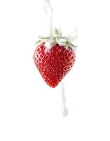 Strawberries with milk on an isolated background photo