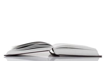 Open book on white background photo