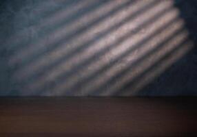Table top with concrete wall on background photo