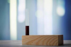 Test tube with blood on a table in a laboratory photo