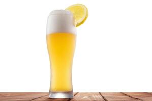 White beer with lemon on an isolated background photo