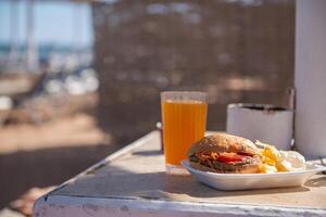 Beach Food - Burger, Potato and Mango Juice photo