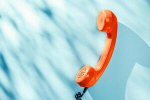 A telephone on a blue background photo
