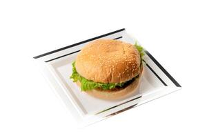 Burger on a plate with isolated background photo